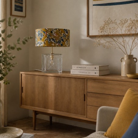 Lampe vintage en pavé de verre lumineux et abat-jour fleuri artisanal.